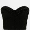 Corsét Perlas estructurado con varillas, tirantes ajustables y extraíbles. borches traseros de corchetes para un ajuste perfecto. Versátil, ideal como base o top.